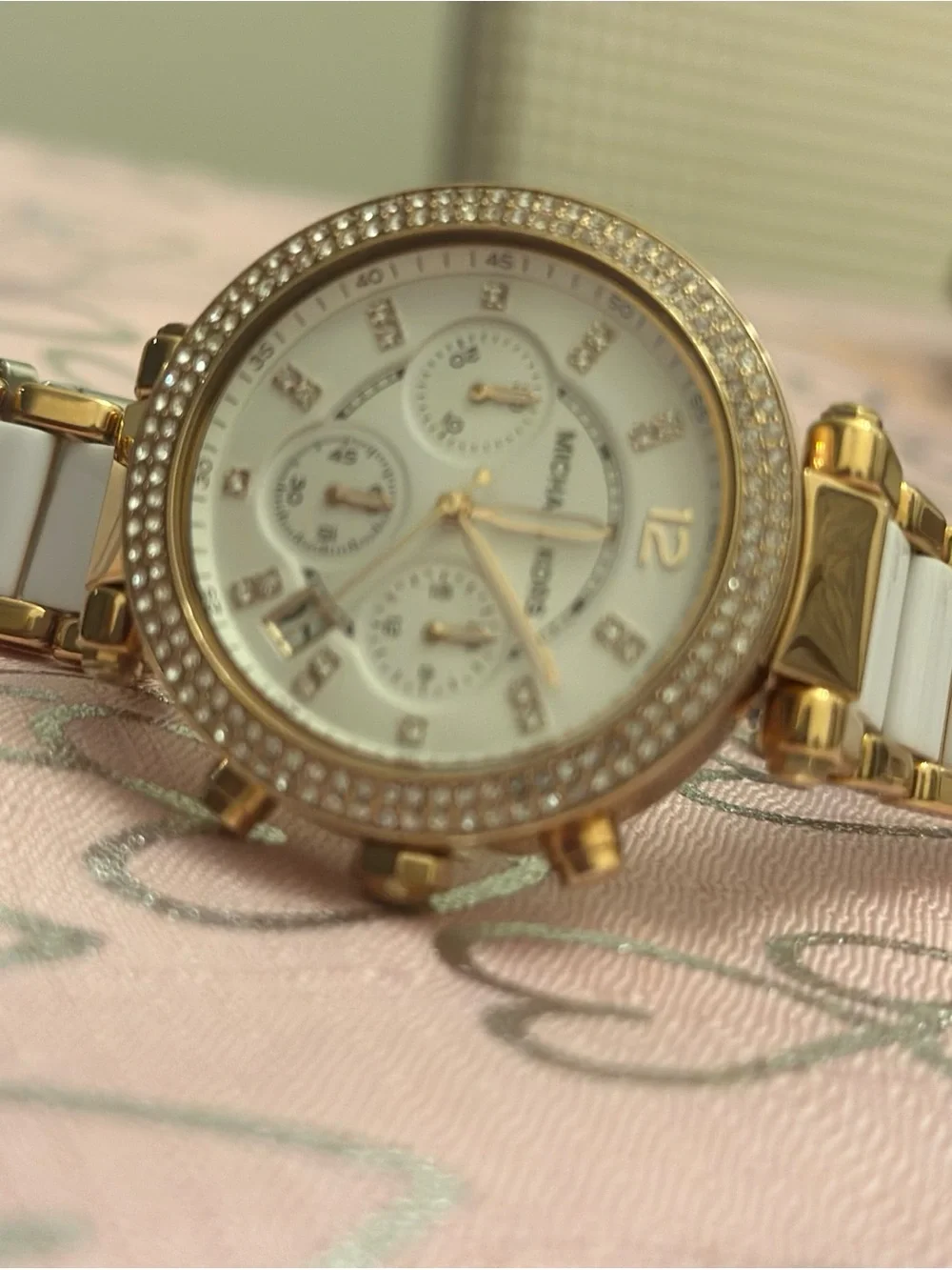 Michael Kors Gold and White Crystal Bezel Chronograph Watch